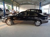 Cần bán xe Daewoo Magnus đời 2004, màu đen xe gia đình, 228tr