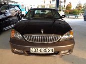 Cần bán xe Daewoo Magnus đời 2004, màu đen xe gia đình, 228tr