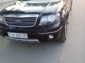 Cần bán Ford Escape 2.3 năm 2005, màu đen, xe cũ