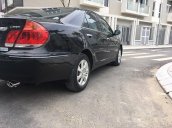 Chính chủ bán lại xe Toyota Camry 3.0 V6 đời 2004, màu đen