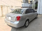 Gia đình cần bán xe Chevrolet Lacetti MT 2014 màu bạc