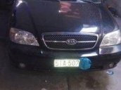 Bán xe cũ Kia Carnival MT đời 2007, màu đen, giá bán 215 triệu