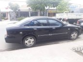 Cần bán lại xe Daewoo Magnus đời 2004, màu đen số tự động