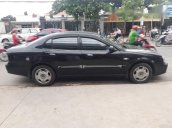 Cần bán lại xe Daewoo Magnus đời 2004, màu đen số tự động