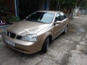 Cần bán xe Daewoo Lacetti đời 2004, màu vàng, xe cũ