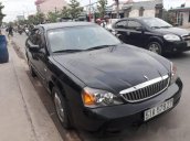 Cần bán lại xe Daewoo Magnus đời 2004, màu đen số tự động