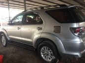 Công ty cần bán xe Toyota Fortuner 2014, màu bạc, máy dầu, số sàn