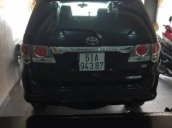 Cần tiền bán gấp xe Toyota Foturner 2014, màu đen