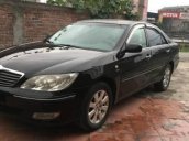 Bán xe cũ Toyota Camry đời 2002, màu đen số sàn, 300 triệu