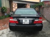 Bán xe cũ Toyota Camry đời 2002, màu đen số sàn, 300 triệu