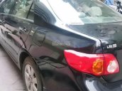 Bán xe cũ Toyota Corolla Altis 1.8AT đời 2009, màu đen số tự động, giá tốt