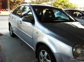 Gia đinh cần bán xe Daewoo Lacetti màu bạc, số sàn, Sx năm 2009