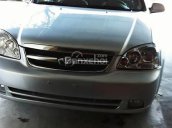 Gia đinh cần bán xe Daewoo Lacetti màu bạc, số sàn, Sx năm 2009