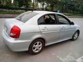 Cần bán Hyundai Verna 1.4 đời 2010, màu bạc, nhập khẩu số tự động