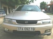 Cần bán lại xe Mazda 323 đời 2001, màu bạc xe gia đình, 112tr