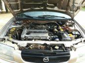 Cần bán lại xe Mazda 323 đời 2001, màu bạc xe gia đình, 112tr