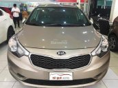 Cần bán lại xe Kia K3 2.0AT đời 2013, màu vàng số tự động