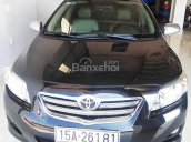 Cần bán xe cũ Toyota Corolla Altis 1.8G đời 2010, màu đen