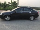 Cần bán xe Chevrolet Lacetti đời 2011, màu đen xe gia đình