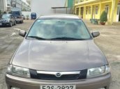 Cần bán xe Mazda 323 đời 2000, màu xám, nhập khẩu nguyên chiếc