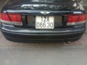 Bán Mazda 626 đời 1997, màu đen, 123 triệu