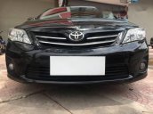 Bán Toyota Corolla Altis 1.8G đời 2011, màu đen số tự động 