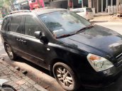 Bán ô tô Kia Carnival đời 2010, màu đen, nhập khẩu số sàn