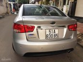 Cần bán Kia Forte AT Sx 2011 màu bạc, xe gia đình