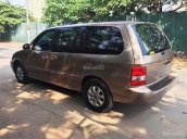 Cần bán Kia Carnival GS đời 2009, màu nâu số tự động