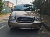 Cần bán Kia Carnival GS đời 2009, màu nâu số tự động