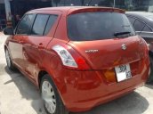 Gia đình không còn nhu cầu sử dụng nên bán xe Suzuki Swift 2014, màu đỏ cam, số tự động, đăng ký tháng 10/2014