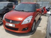 Gia đình không còn nhu cầu sử dụng nên bán xe Suzuki Swift 2014, màu đỏ cam, số tự động, đăng ký tháng 10/2014