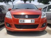 Gia đình không còn nhu cầu sử dụng nên bán xe Suzuki Swift 2014, màu đỏ cam, số tự động, đăng ký tháng 10/2014