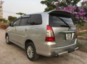 Gia đình bán Toyota Innova G AT đời 2013, màu bạc