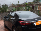 Bán Toyota Corolla altis 1.8 AT đời 2015, màu đen, 745tr