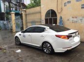 Bán xe cũ Kia Optima AT đời 2012, màu trắng số tự động