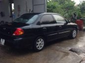 Bán xe chính chủ Kia Spectra đời 2005, màu đen, giá 128tr