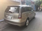 Cần bán lại xe Mitsubishi Grandis AT đời 2009, màu vàng 