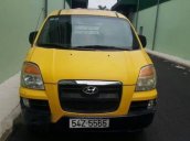 Bán xe Hyundai Starex đời 2009, màu vàng