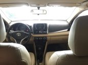 Cần bán Toyota Vios E 1.5 2015 màu bạc, xe đẹp như mới