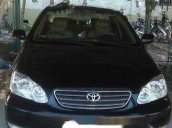 Bán Toyota Corolla altis 2003, màu đen số sàn, 270tr