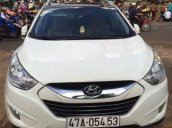 Bán Hyundai Tucson 4WD đời 2010, màu trắng số tự động, giá 630tr