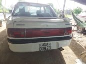 Cần bán lại xe Mazda 323 đời 1996, màu trắng giá cạnh tranh