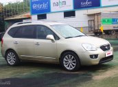 Cần bán Kia Carens SX 2.0AT đời 2011, màu vàng