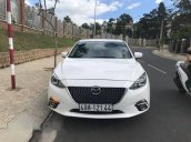 Bán xe chính chủ Mazda 3 1.5AT sản xuất 2015, màu trắng