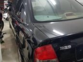 Bán Mazda 323 đời 2003, màu đen  