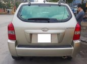 Bán Hyundai Tucson 4WD đời 2009, màu vàng số tự động