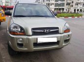 Bán Hyundai Tucson 4WD đời 2009, màu vàng số tự động