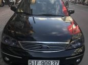 Bán Ford Laser 1.8MT đời 2003, màu đen số sàn