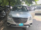 Bán xe Toyota Innova 2.0E năm 2014, màu bạc chính chủ, 595 triệu